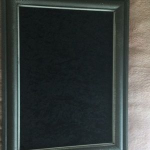 Gray silver the material is leather and wood.